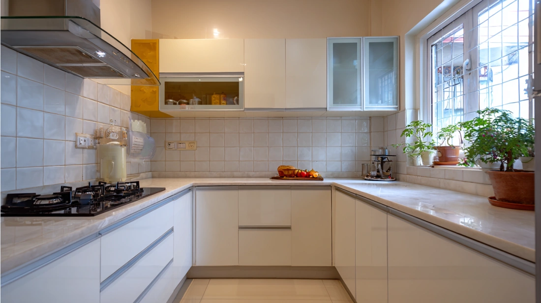 White Glossy Modular Kitchen with Tile Backsplash